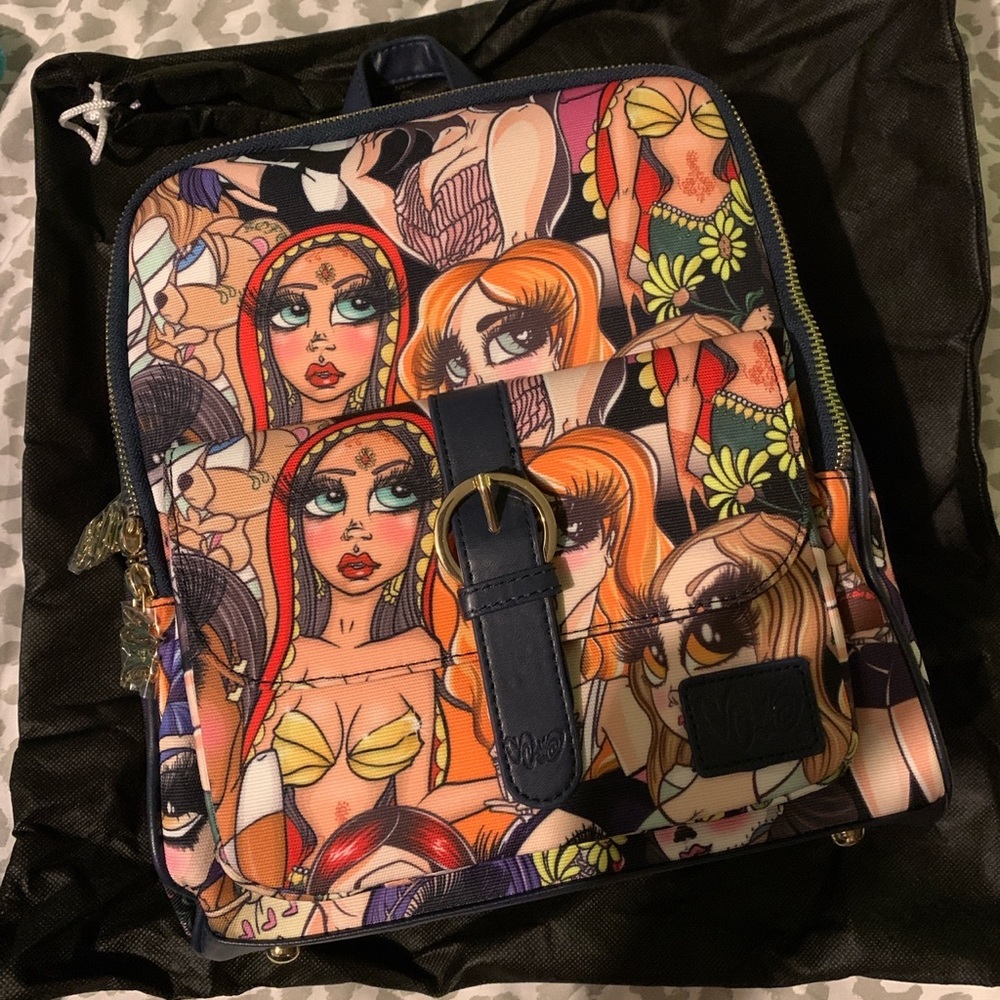 Authentic sand dolls collage backpack